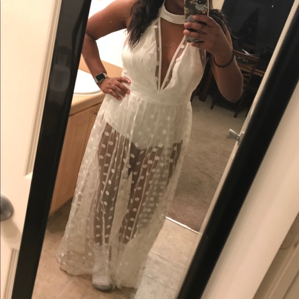 white body suit with polka dot overlay
